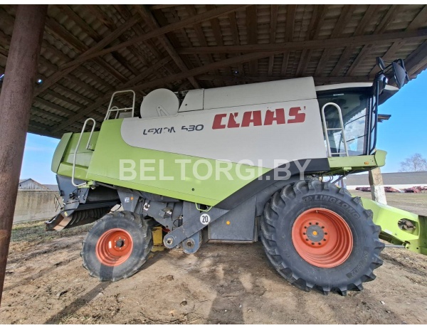 Комбайн зерноуборочный Claas Lexion 530, 2005 г.в., заводской № 58300717; в комплекте с зерновой жаткой Claas Auto-Contour и транспортной тележкой